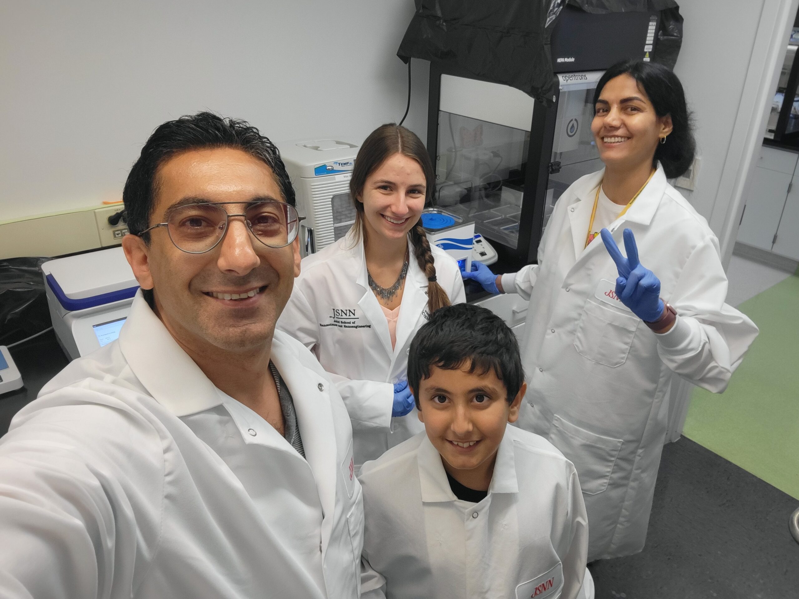 Z-Lab members outside the Joint School of Nanoscience and Nanoengineering